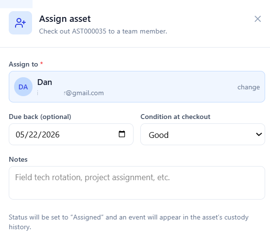 The Assign asset dialog showing the team member picker, an optional due-back date, condition at checkout, and a notes field